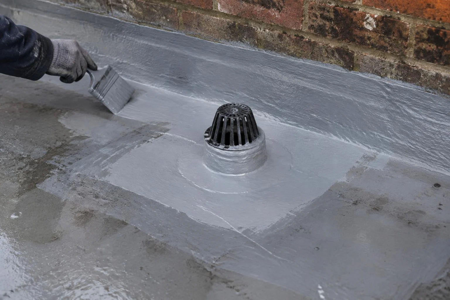 Liquid waterproofing repair around a flat-roof outlet beside a brick wall. AI-generated illustration, not an LMB project.